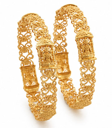 Two gold bracelets with intricate designs on a white background